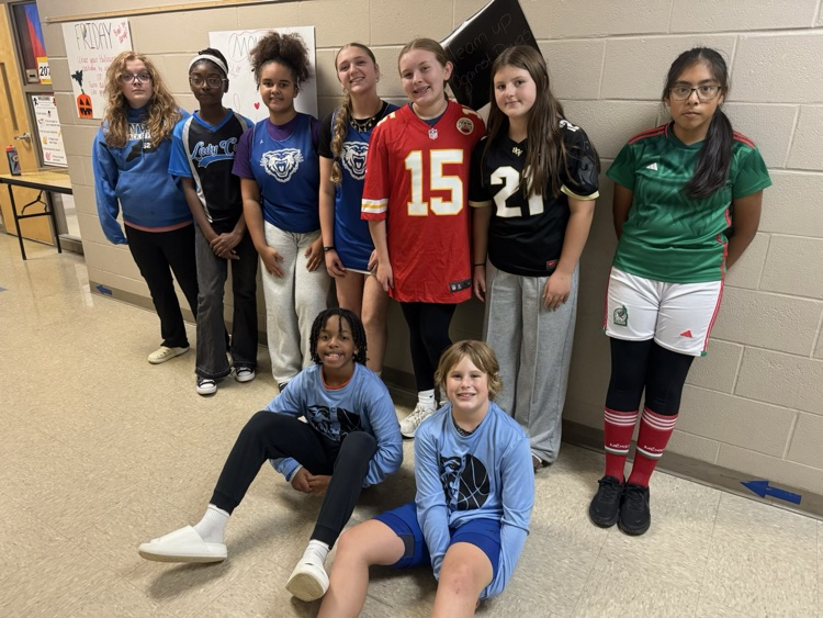 dressed in team jerseys!