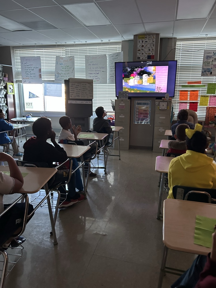 Class working on writing stories.