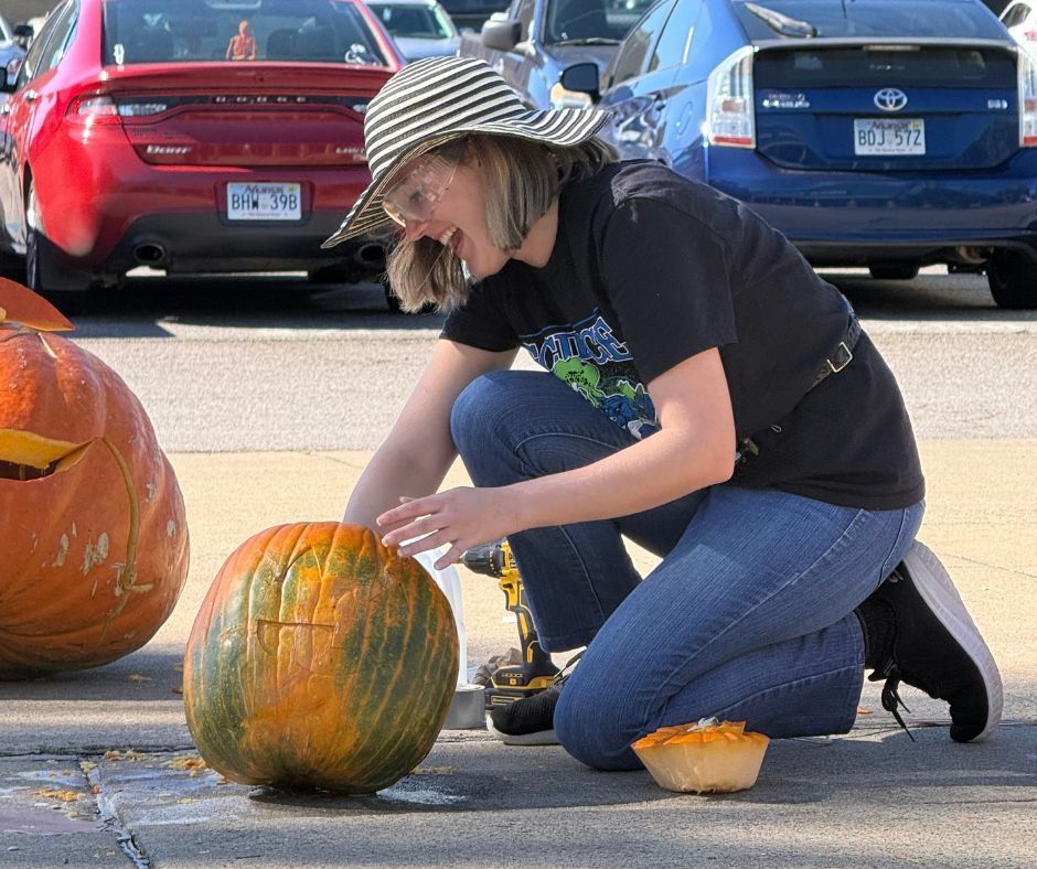 woman adding the calcium carbide for the experiement.