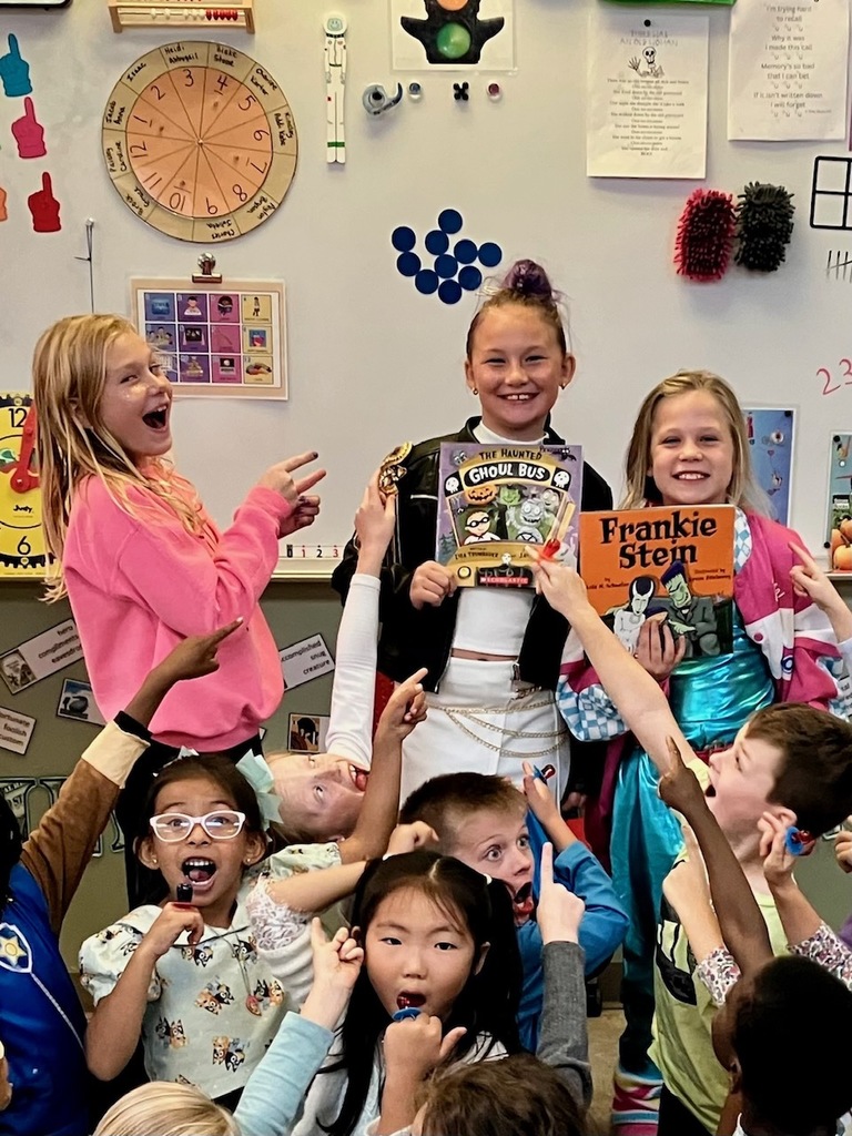 Mr. Smith’s first graders thought these third grade guest readers were the coolest!