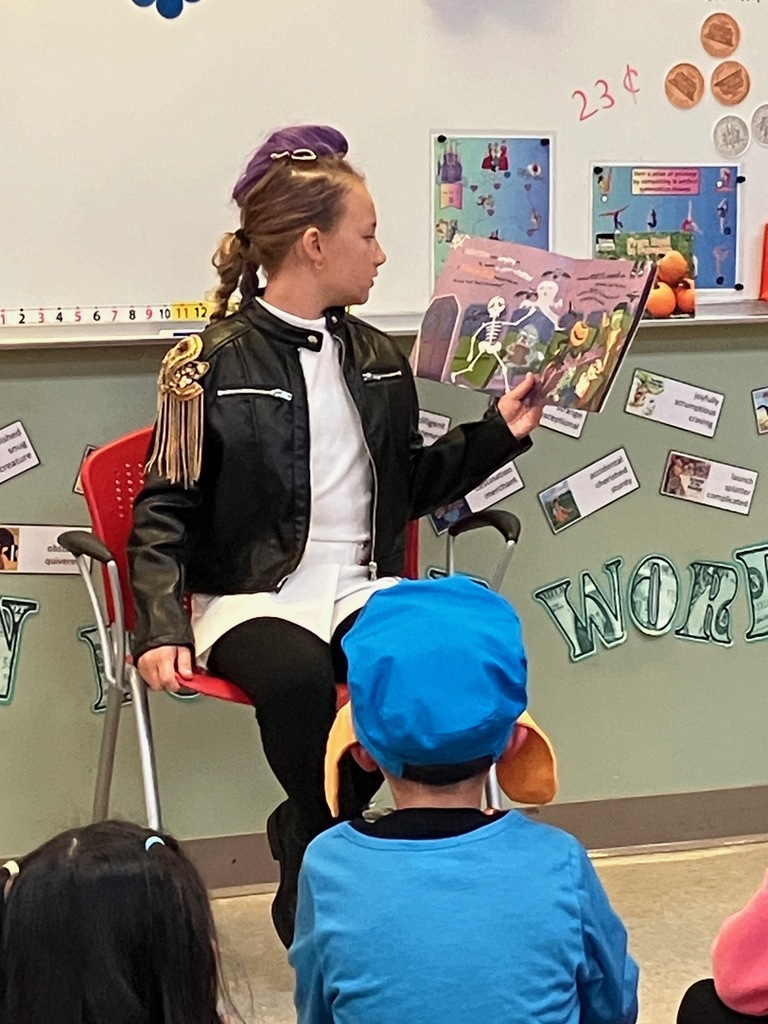 Mr. Smith’s first graders thought these third grade guest readers were the coolest!