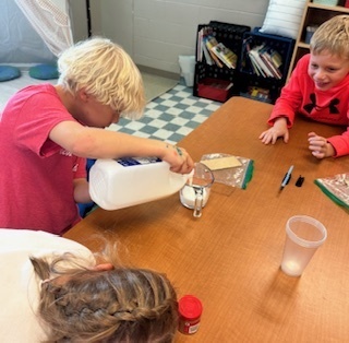 Mrs. Harrison's Second Graders have been working on a "How to Make a Pumpkin Pie" informational writing. We decided to try out our own advice and make a pumpkin pie in a cup. You can tell by our faces who's a pumpkin pie fan...and who is not!