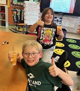 Mrs. Harrison's Second Graders have been working on a "How to Make a Pumpkin Pie" informational writing. We decided to try out our own advice and make a pumpkin pie in a cup. You can tell by our faces who's a pumpkin pie fan...and who is not!