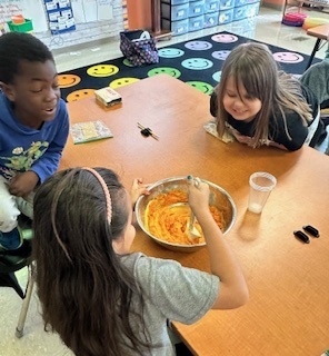 Mrs. Harrison's Second Graders have been working on a "How to Make a Pumpkin Pie" informational writing. We decided to try out our own advice and make a pumpkin pie in a cup. You can tell by our faces who's a pumpkin pie fan...and who is not!