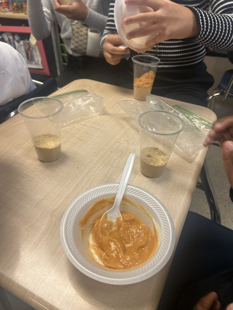students making pumpkin pie cups.