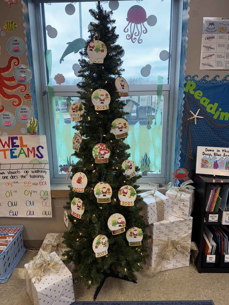 Mrs. Wilcox's classroom elf, Holly Jolly, provided us with ornaments to decorate their Christmas tree today. They are curious to see what she has in store for them next! 