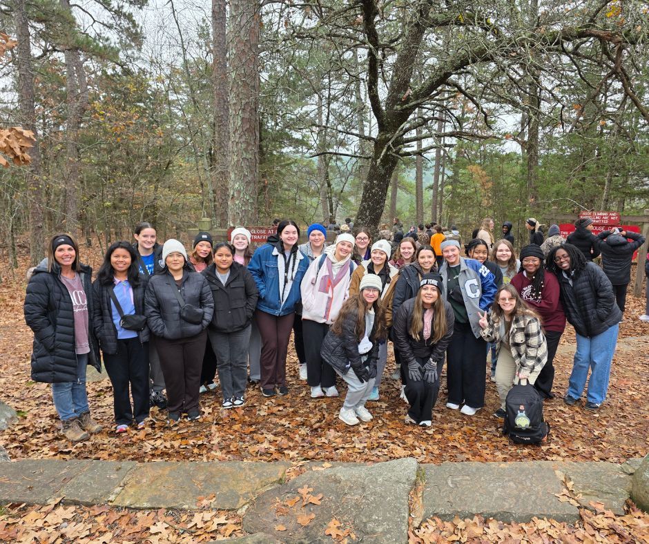 Group of students posing for a picture at Peitit Jean State Park.