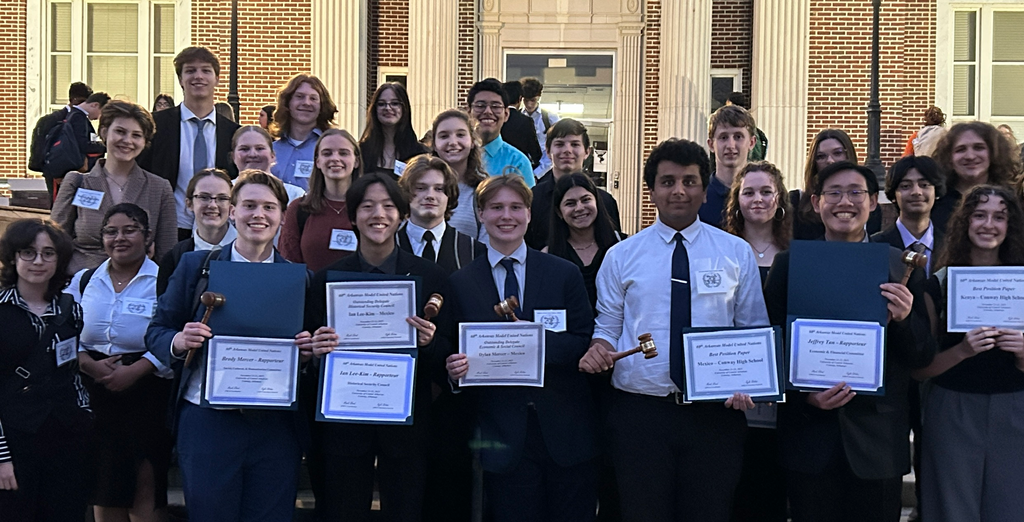 CHS Model UN students pose with their certificates of recognition.