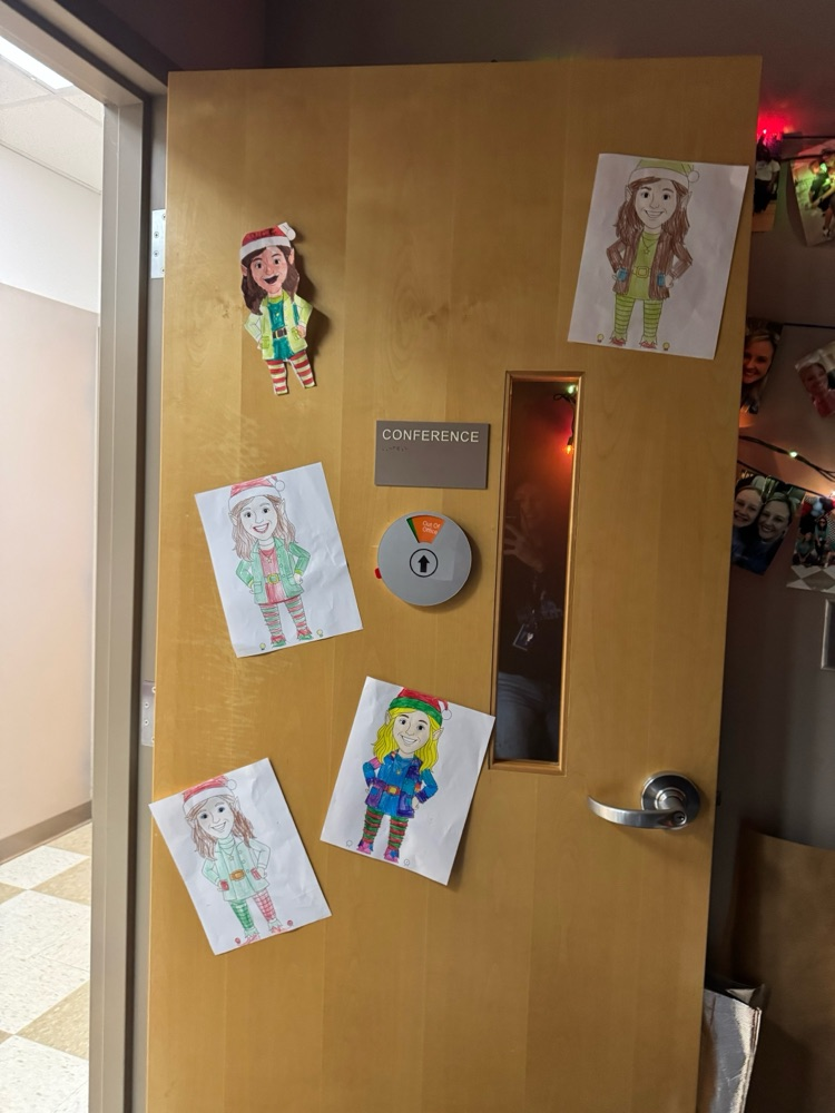 Mrs. Jones and Mrs. Briggler were pranked by the second-grade classes today. They colored elf coloring sheets with their faces and decorated the halls and their offices with them. 