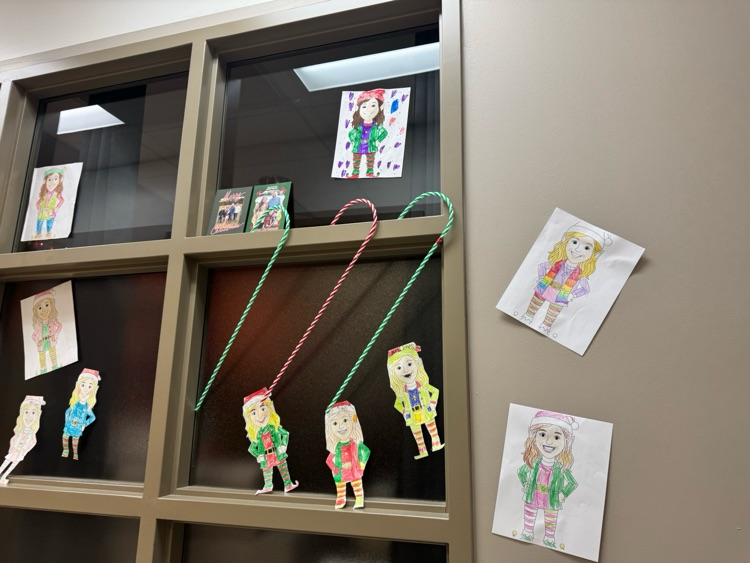 Mrs. Jones and Mrs. Briggler were pranked by the second-grade classes today. They colored elf coloring sheets with their faces and decorated the halls and their offices with them. 