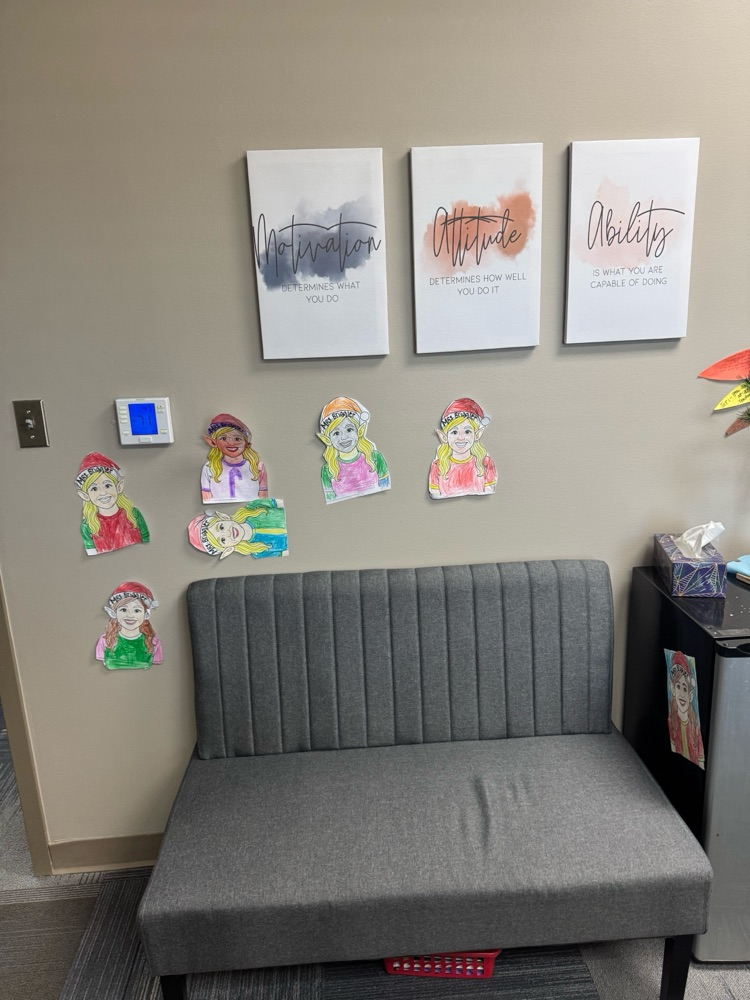 Mrs. Jones and Mrs. Briggler were pranked by the second-grade classes today. They colored elf coloring sheets with their faces and decorated the halls and their offices with them. 