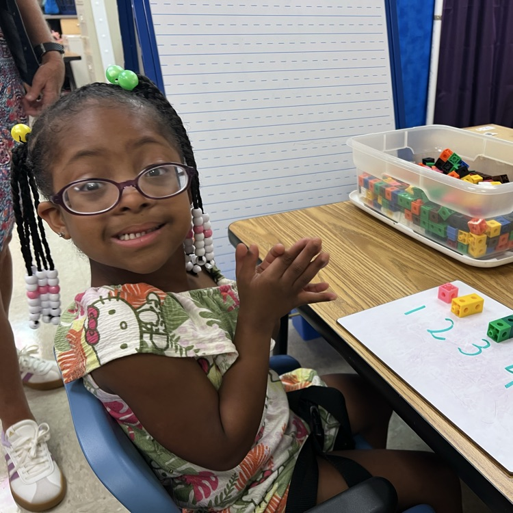 student using blocks for counting 