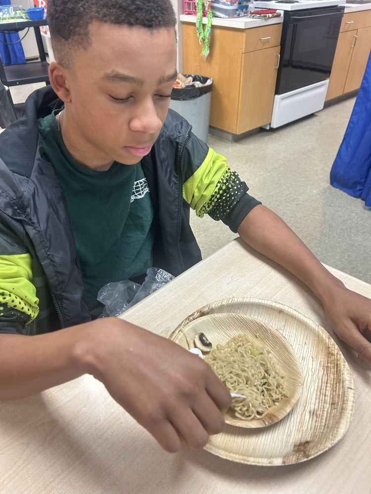 students eating food from around the world.