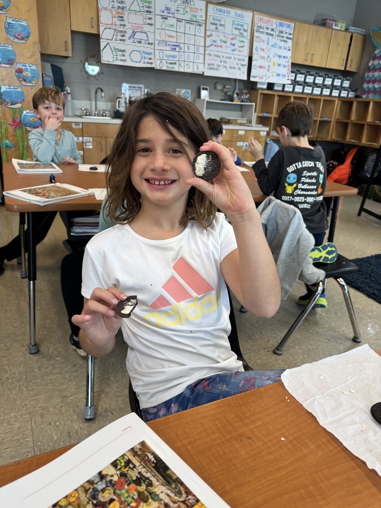 Second-grade students are currently learning about equal parts in math this week. They demonstrated halves, thirds, and fourths using an Oreo! 