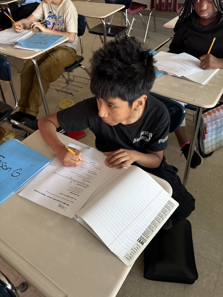 5th Grade students working on writing counterclaims in class