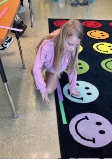 Measuring up to success in 2nd grade! Mrs. Harrison's students have been busy estimating and measuring using inches, feet, and yards building real-world math skills.  They are learning to use the right tools and make smart guesses.  We are so proud of their growing math minds! 