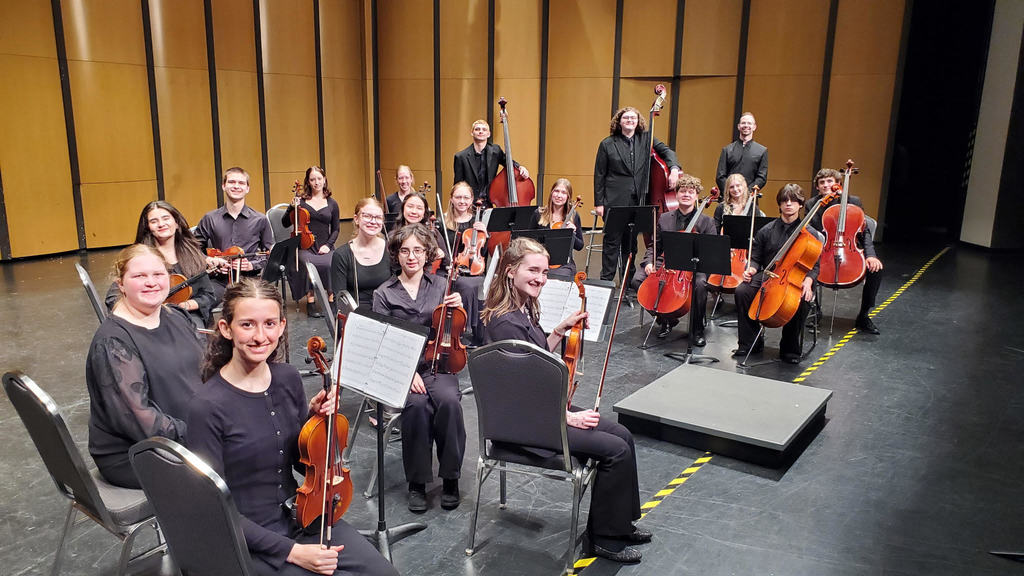 Orchestra students on stage.