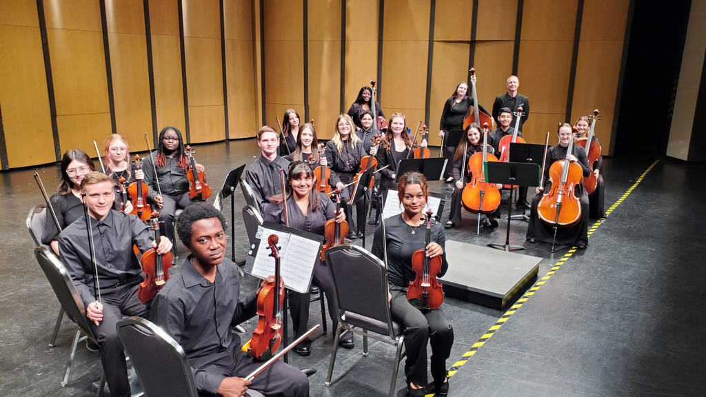 Orchestra students on stage.