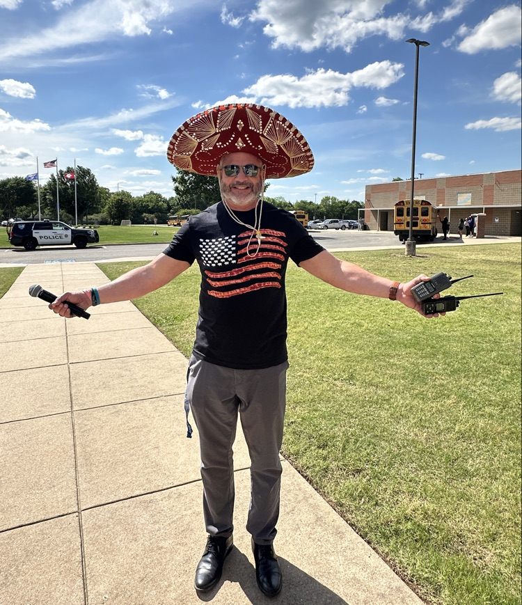 Mr. Etters in a sombrero and bacon flag t-shirt