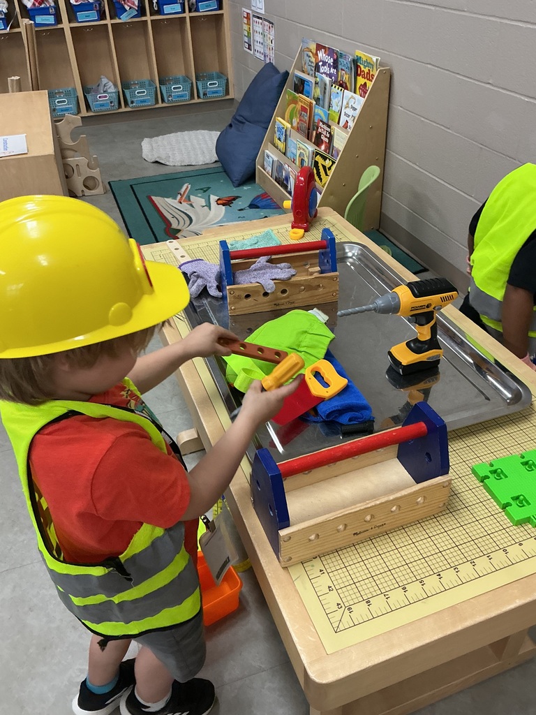 child using toy saw