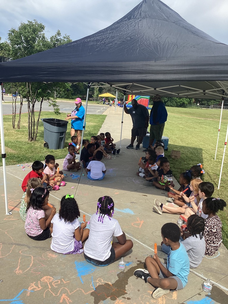 children enjoying popsicles and chalk