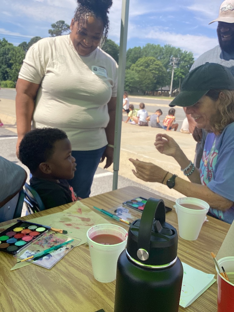 child getting their face painted 