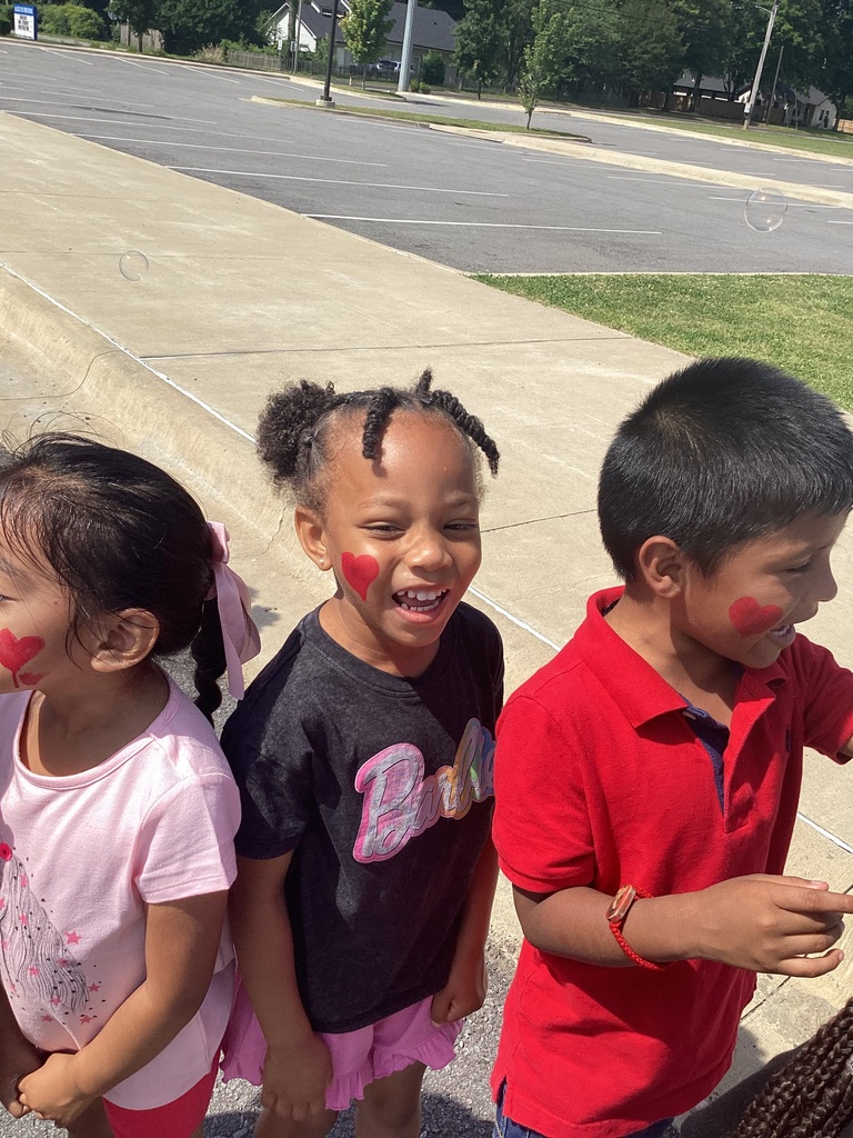 children with their face painted 
