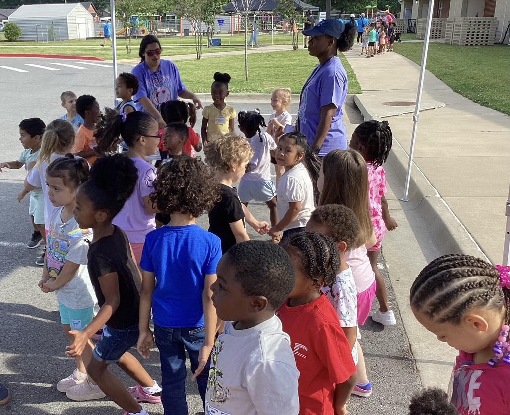 kids dancing and having fun with bubbles