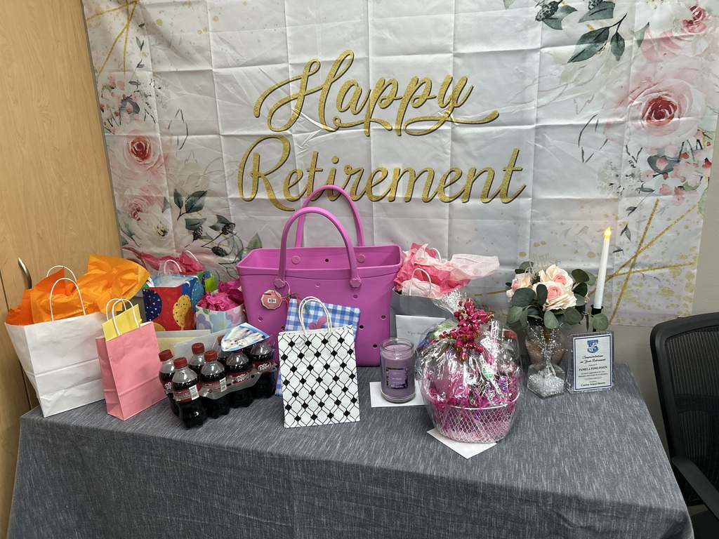 happy retirement sign with gifts