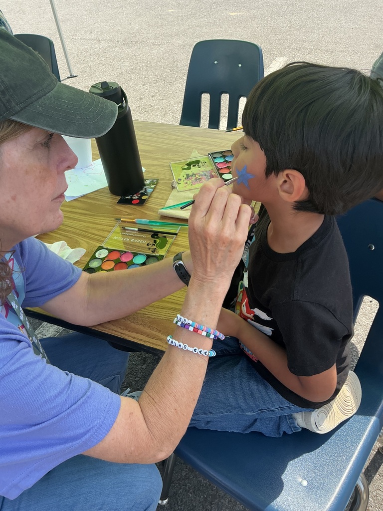 child getting face painted