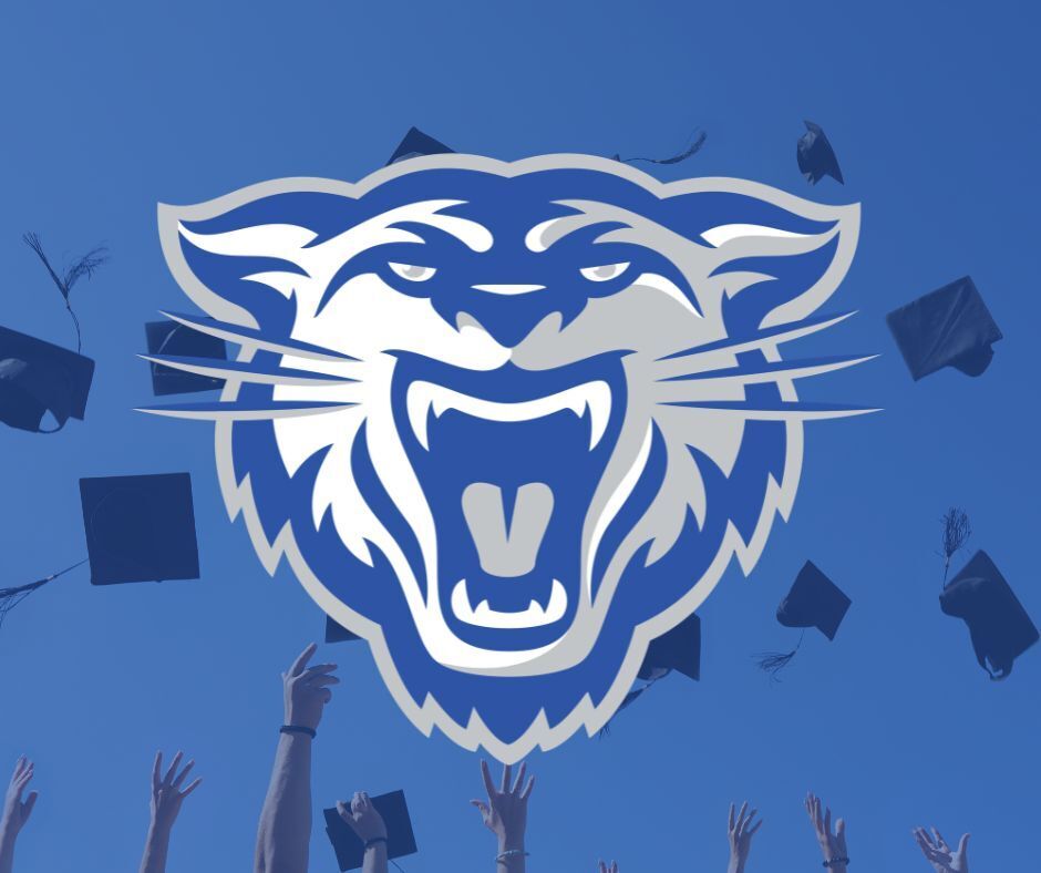 Wampus cat over image of caps being thrown in the air.