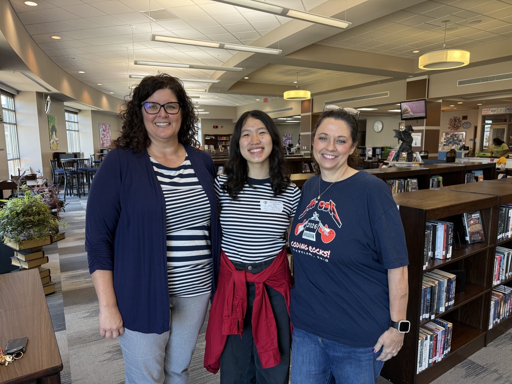 Ellie Feng center with former teachers Ms. Tinsley and Ms. Raup.
