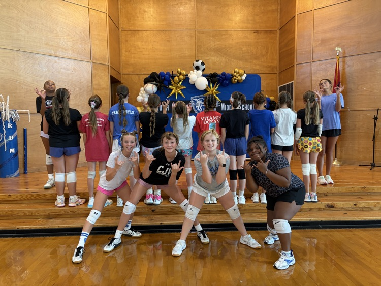 Crazy hair! They don’t care! Ruth Doyle volleyball having fun while getting better.