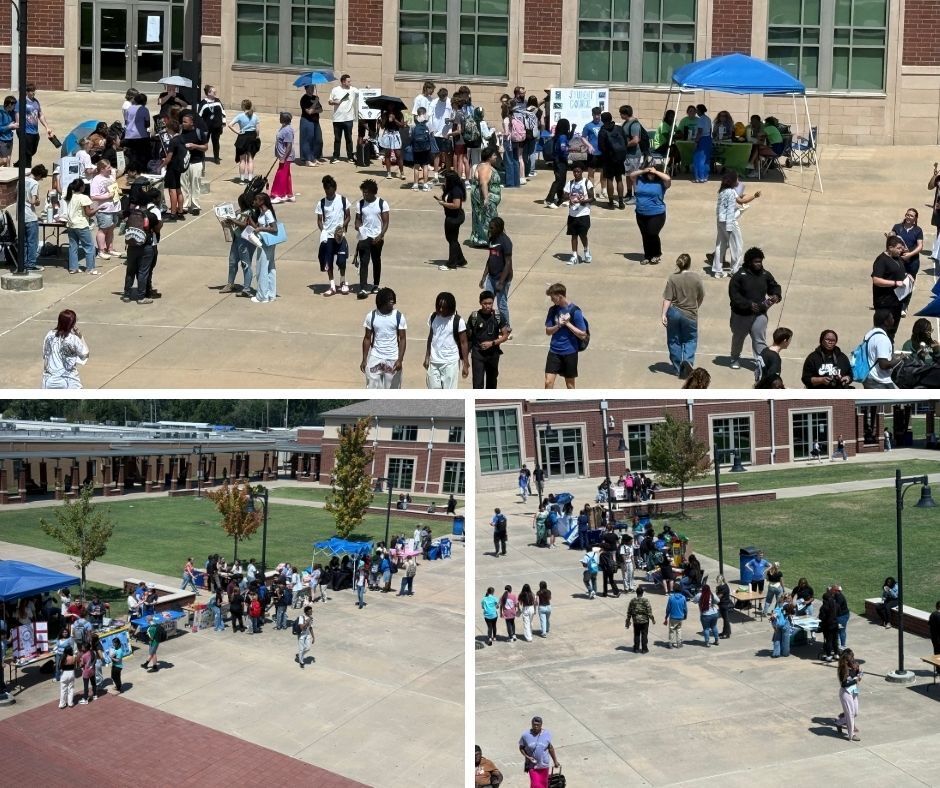 Distance image of students exploring the club fair.