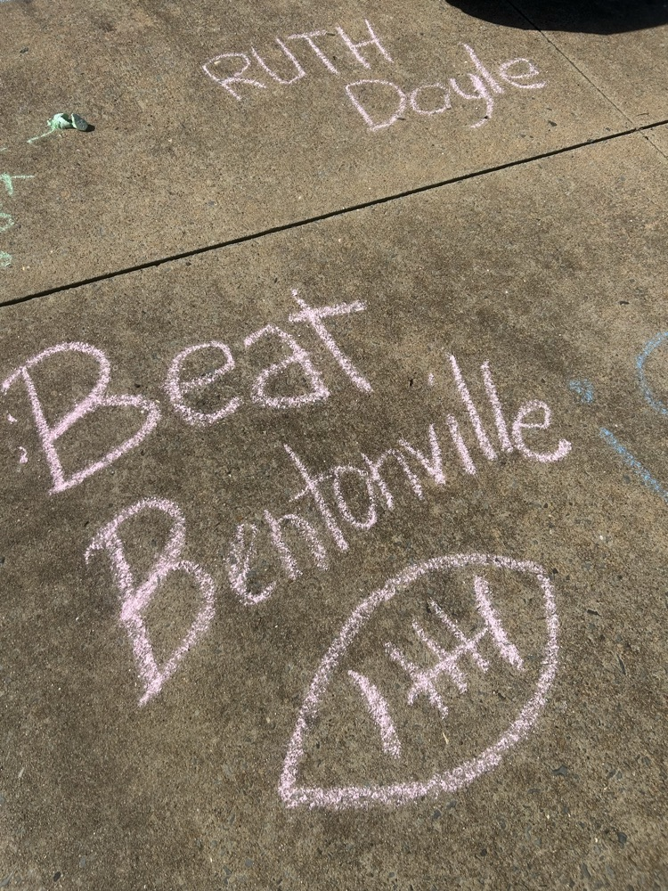 sidewalk chart art says Beat Bentonville with a football