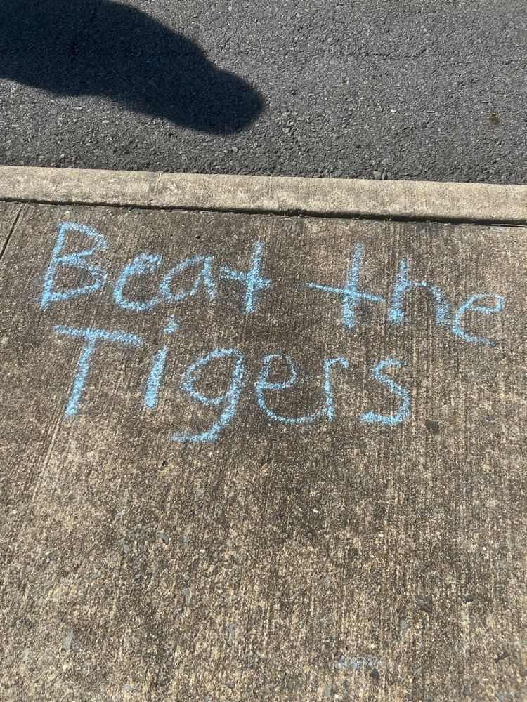 sidewalk chart art says Beat the Tigers