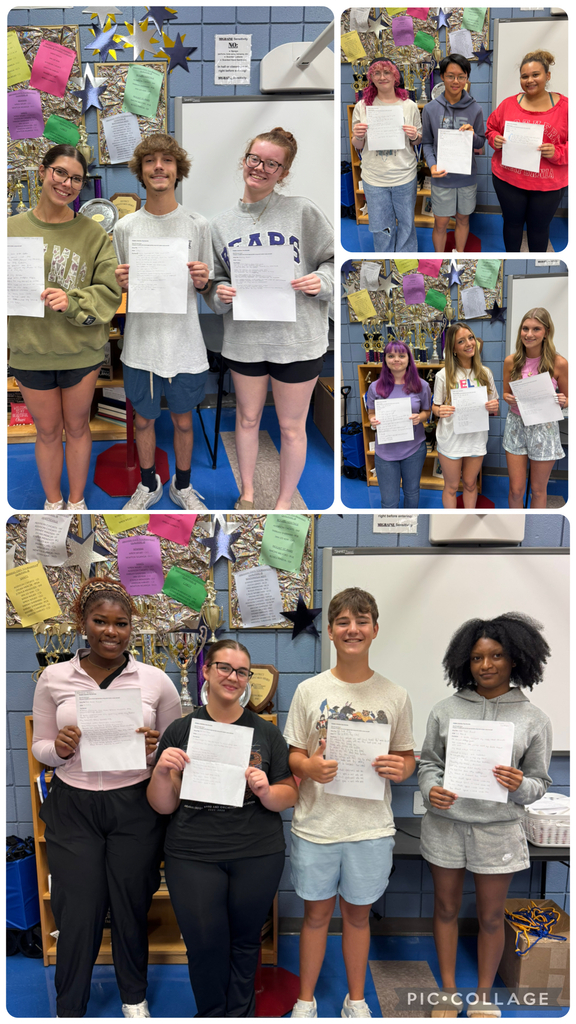 students holding their pop sonnets