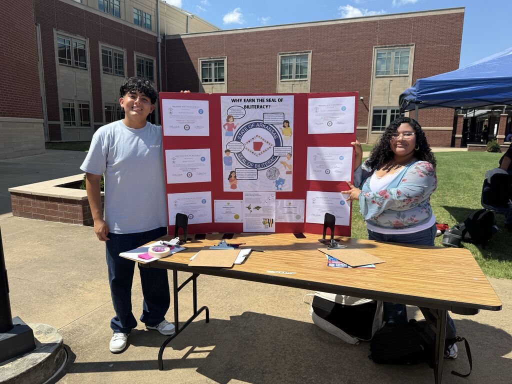 students repping the Seal of Biliteracy table.