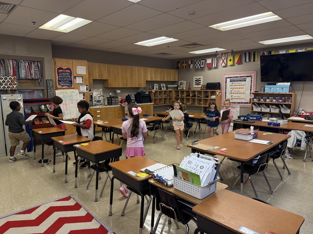 🔢💙 Math in Motion! 💙🔢 Mrs. Lute’s first graders got up and moving today as they did a walk around the room to find the totals for different number bonds! ➕✨ We’re learning that math can happen anywhere—even while we’re on the move! 🚶♀️🚶♂️📚 Way to go, Little Cats! 🐾💙