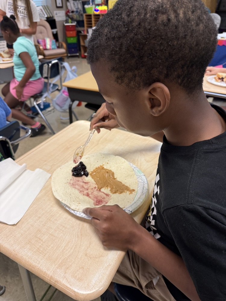 Making peanut butter and jelly sandwiches