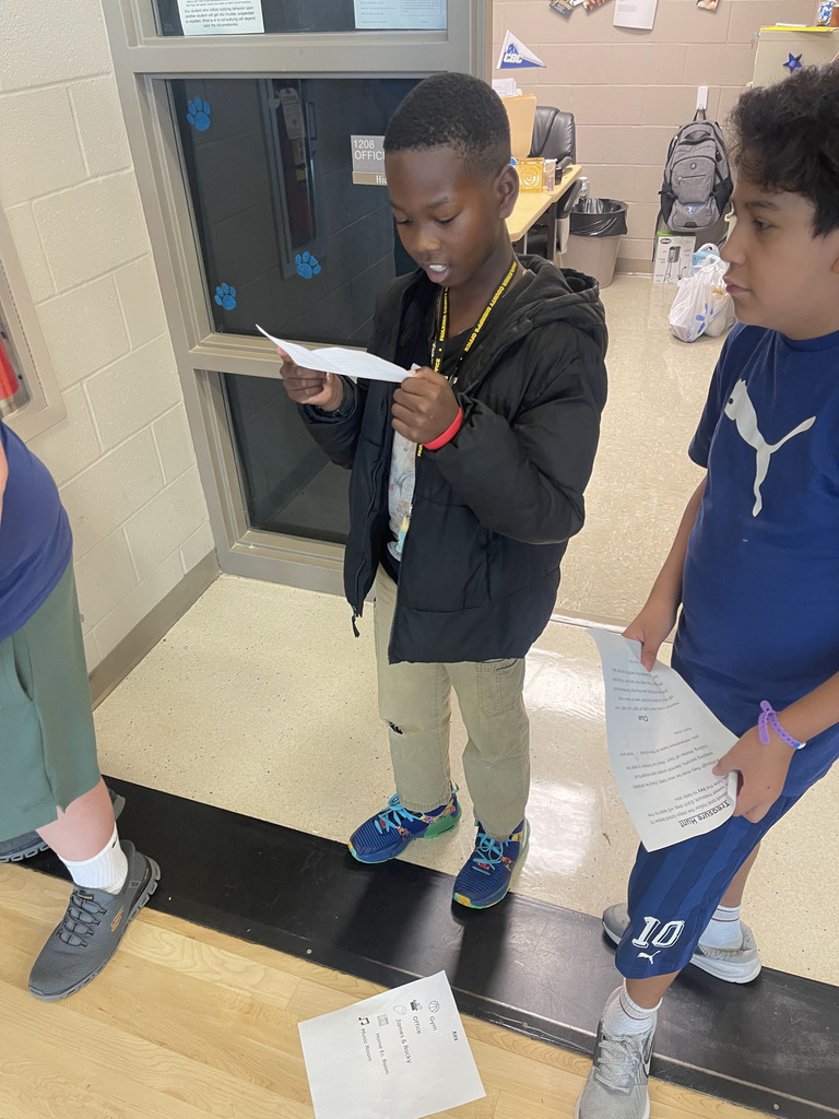 Ms Jackson's class using reading skills and problem solving skills to meet their new class pet.