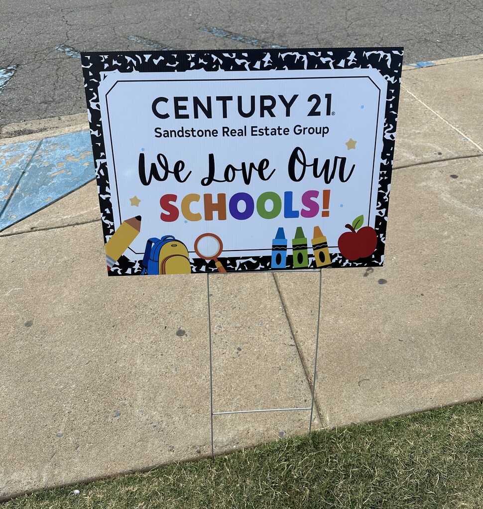 Teachers with Friday snacks and drinks provided by Century 21