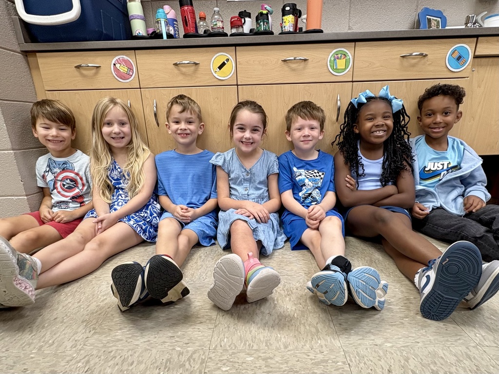 first grade wearing blue