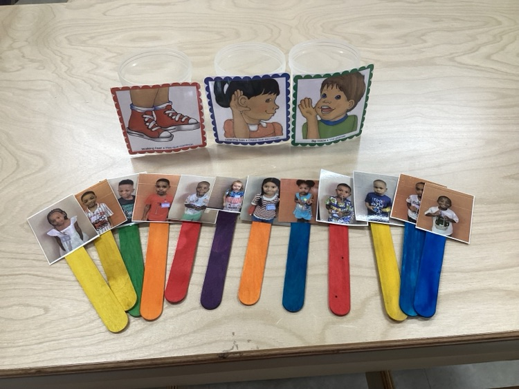 commitment sticks that the kids choose to commitment to each day, which are walking feet, listening ears, and using a big voice