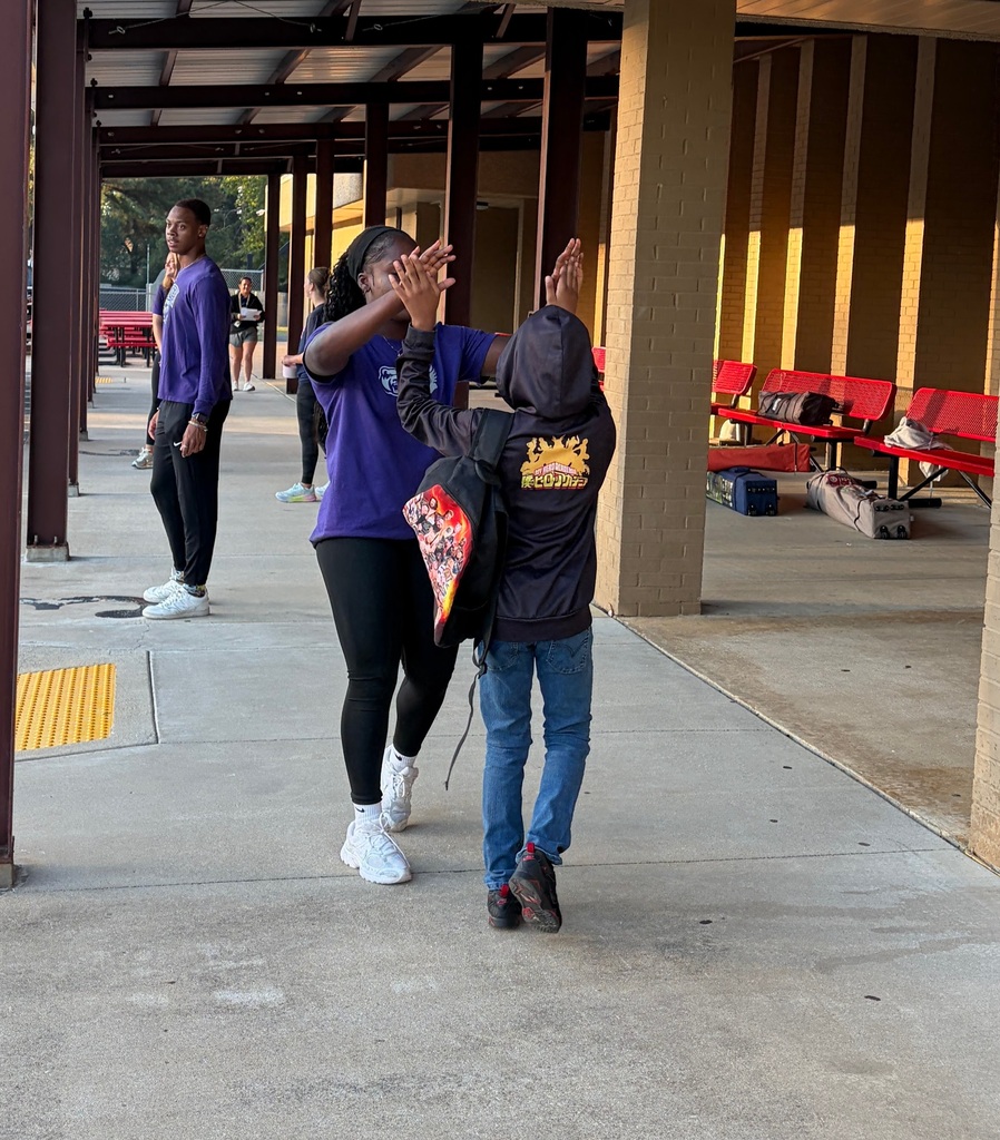 uca track team and Conway volley ball team opening car doors