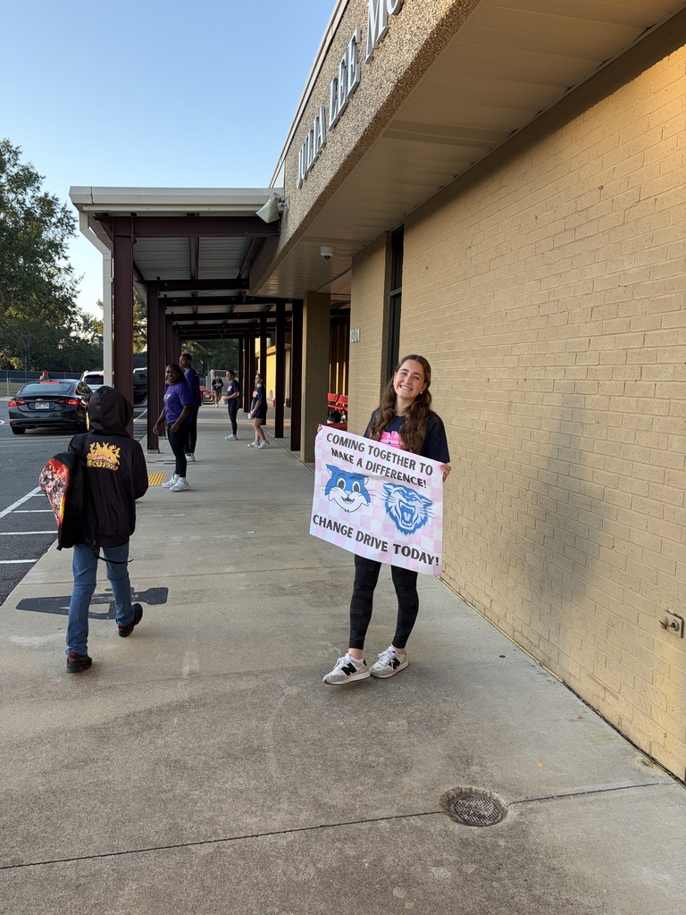 uca track team and Conway volley ball team opening car doors