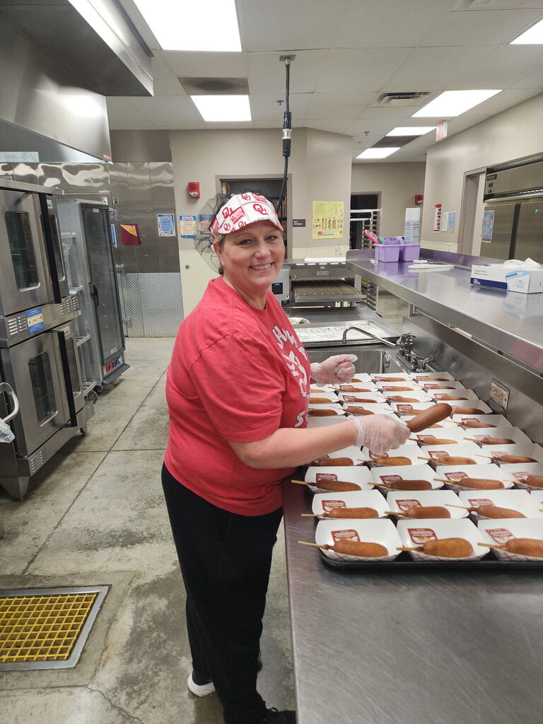 Food Service Worker prepping lunch, serving lunch.