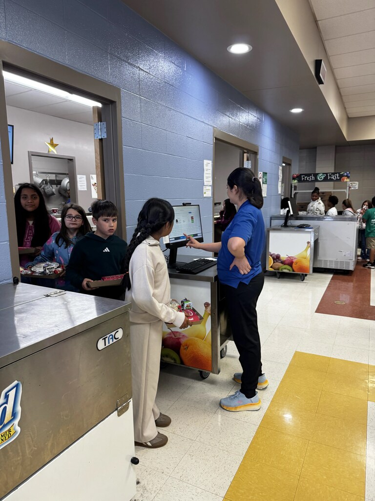 Food Service Worker prepping lunch, serving lunch.