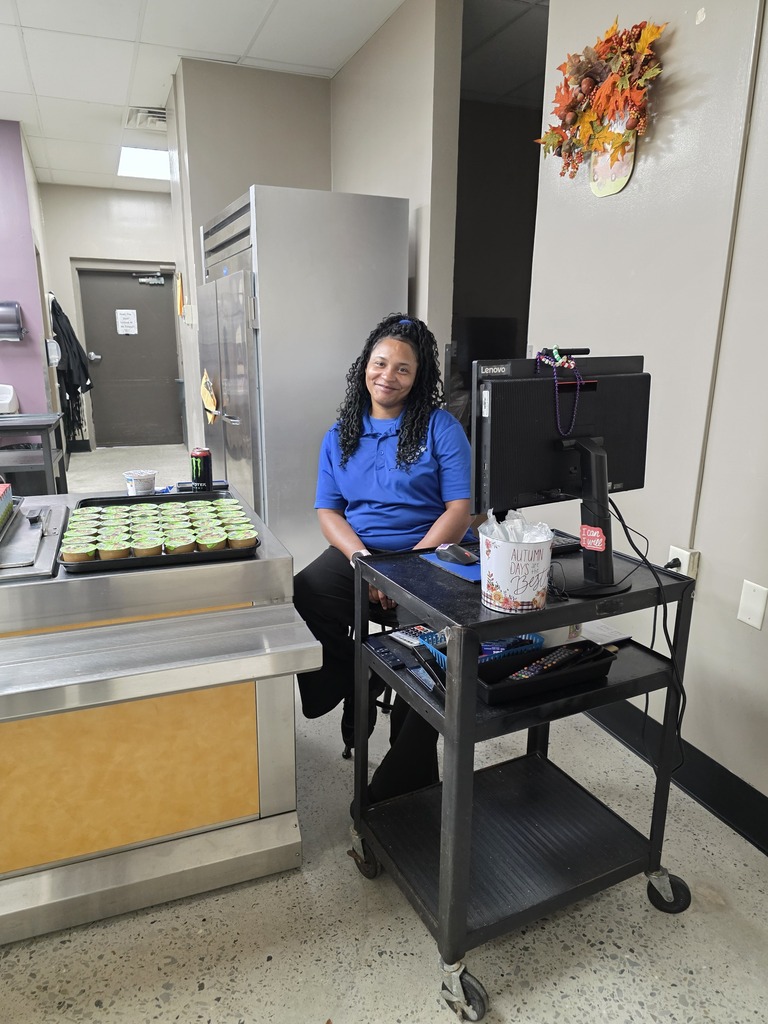 Food Service Worker smiling at camera
