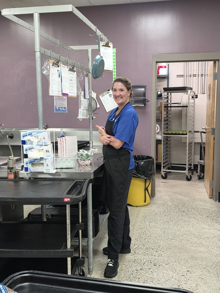 Food service worker smiling at camera